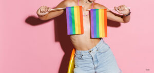 Person with gender equality flag over chest